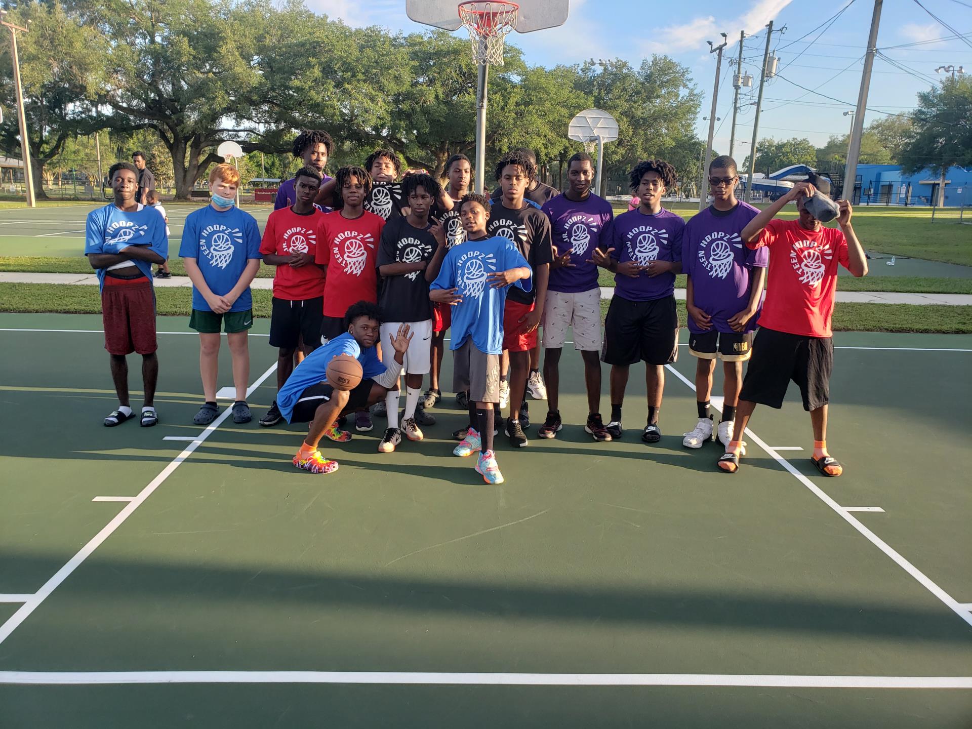 Group of children part of the hoopz league posing for a photo