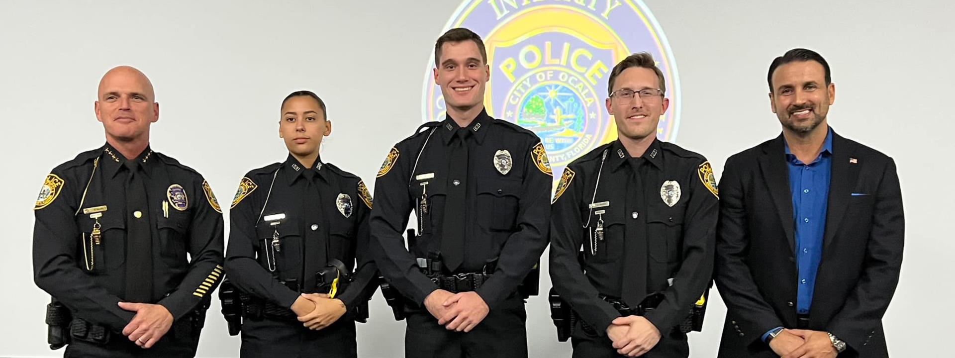 Ocala Police Department Officers pose with Mayor Marciano